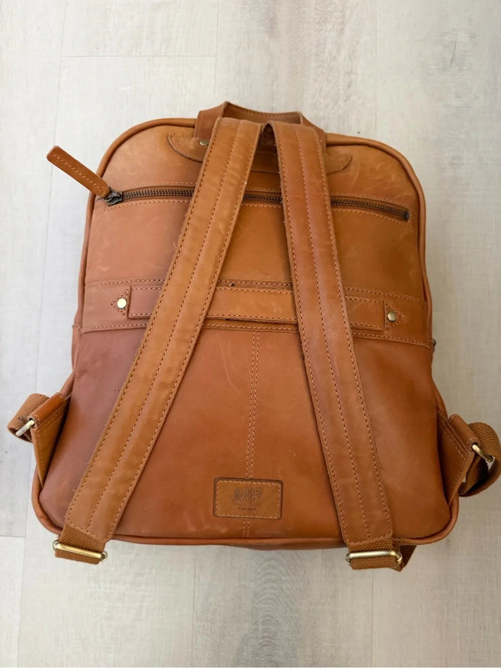 Marta Ponti Portugal Leather Backpack with rolling luggage strap